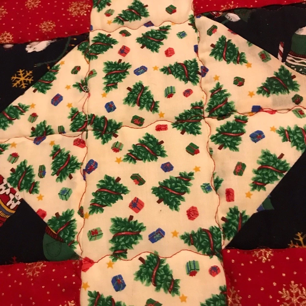 Handcrafted a quilted reversible table runner. Lots of stitching detail